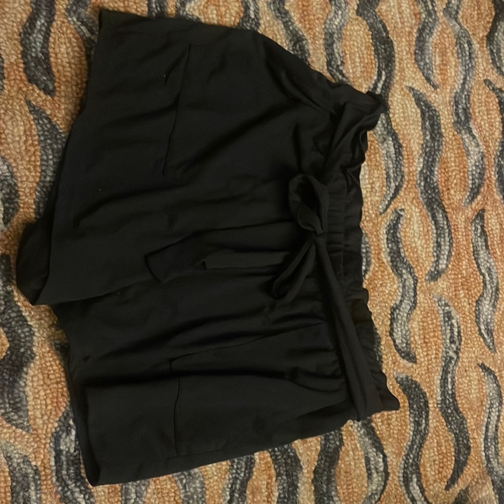 L black paper bag shorts with tie waist.